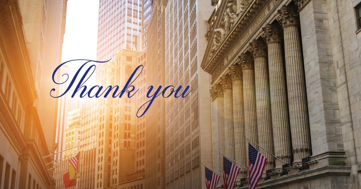 A thank-you card with the image of a the sun setting beside a stone building with large columns and flags on flagpoles. A thank-you card with the image of a the sun setting beside a stone building with large columns and flags on flagpoles.